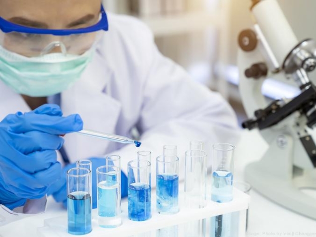 Laboratory technicians at work.
