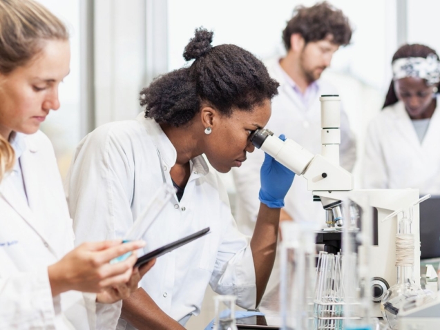 Laboratory technicians at work.